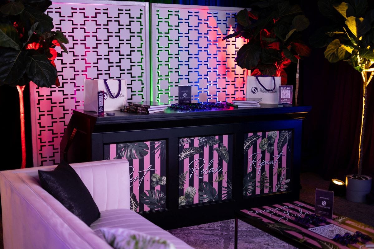 Black Savannah Bar with White Partition Walls and Topiary